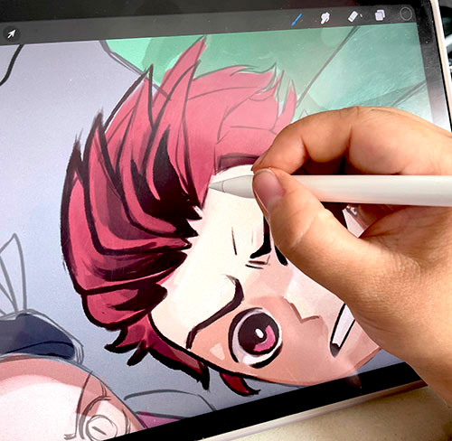 Dessin de personnage manga en cours de réalisation sur tablette à l'atelier Edumanga